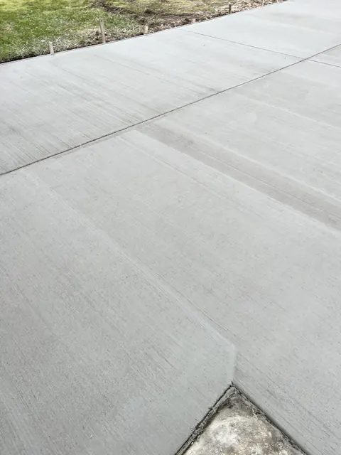 Close-up of a fresh broom finish with a cut control joint